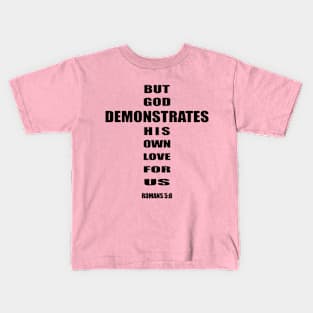 But God demonstrates his own love for us romans 5-8 Kids T-Shirt